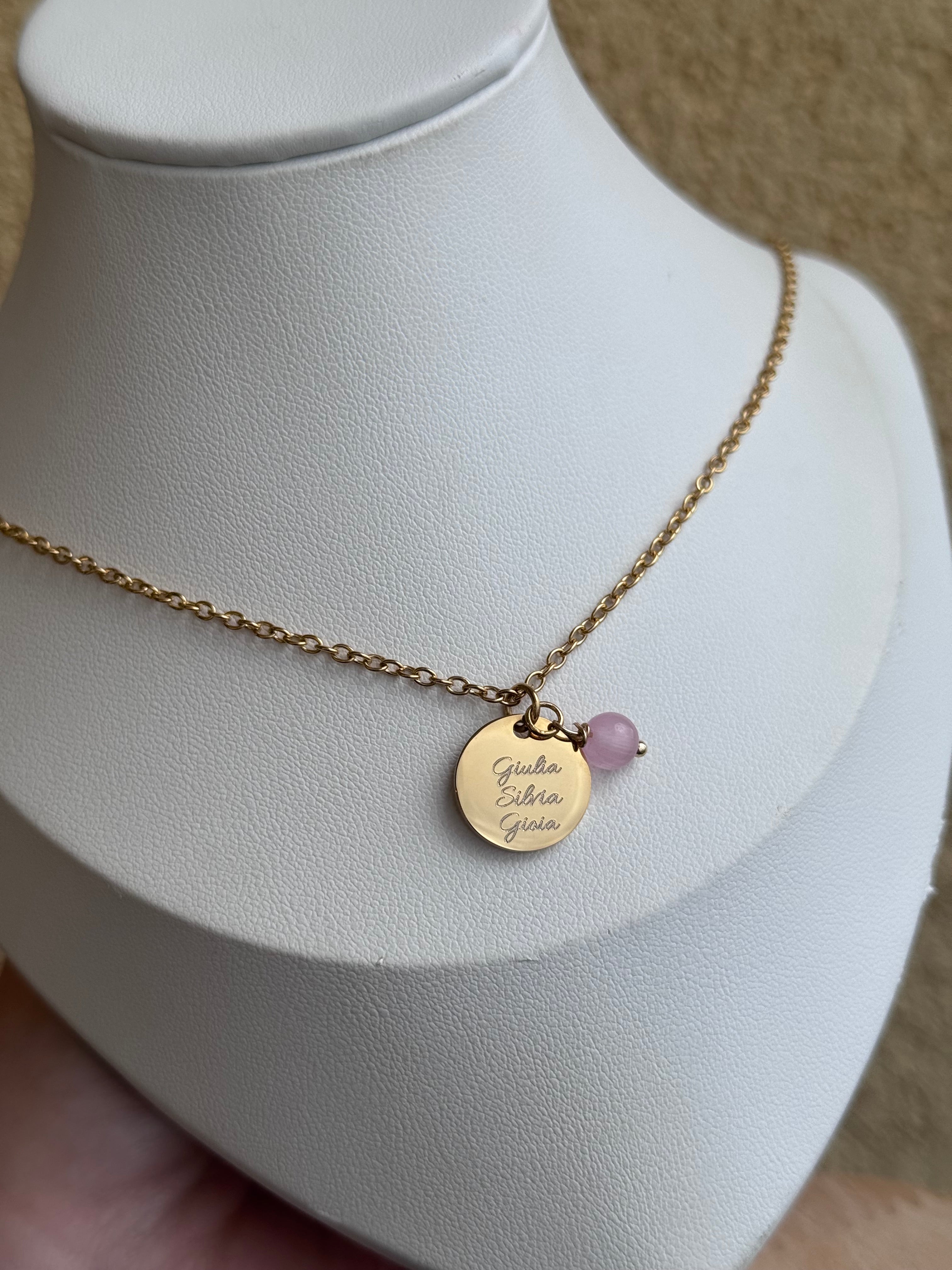 Collana sfera dorata con pietra