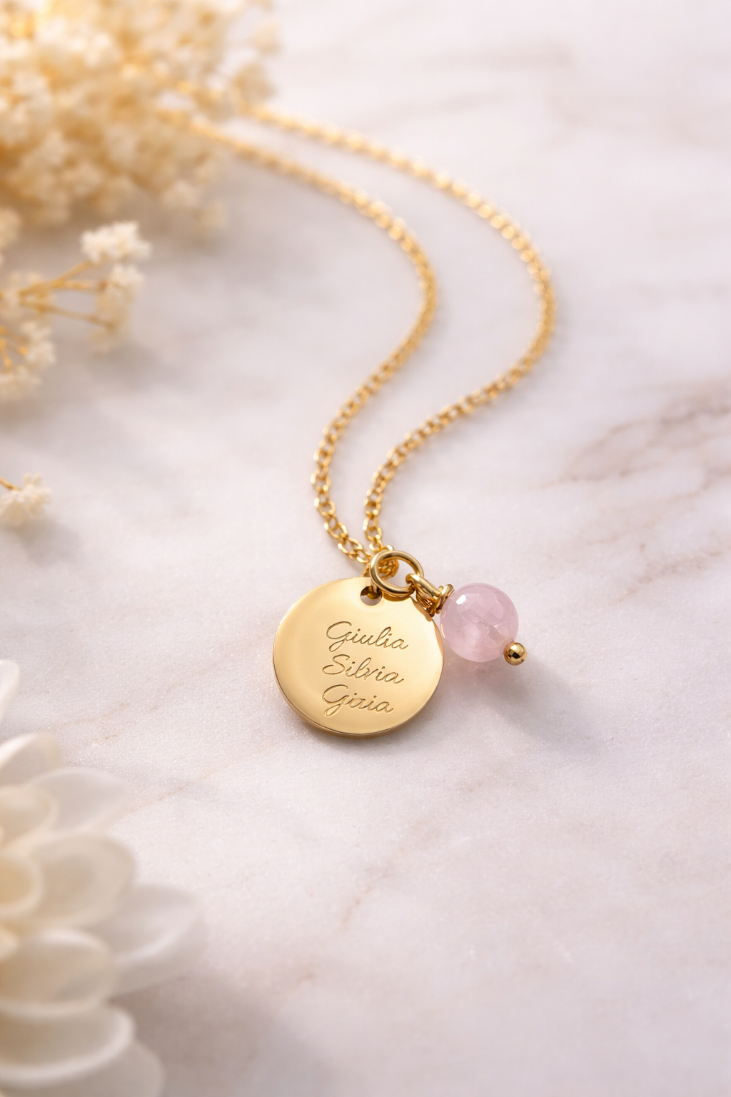 Collana sfera dorata con pietra