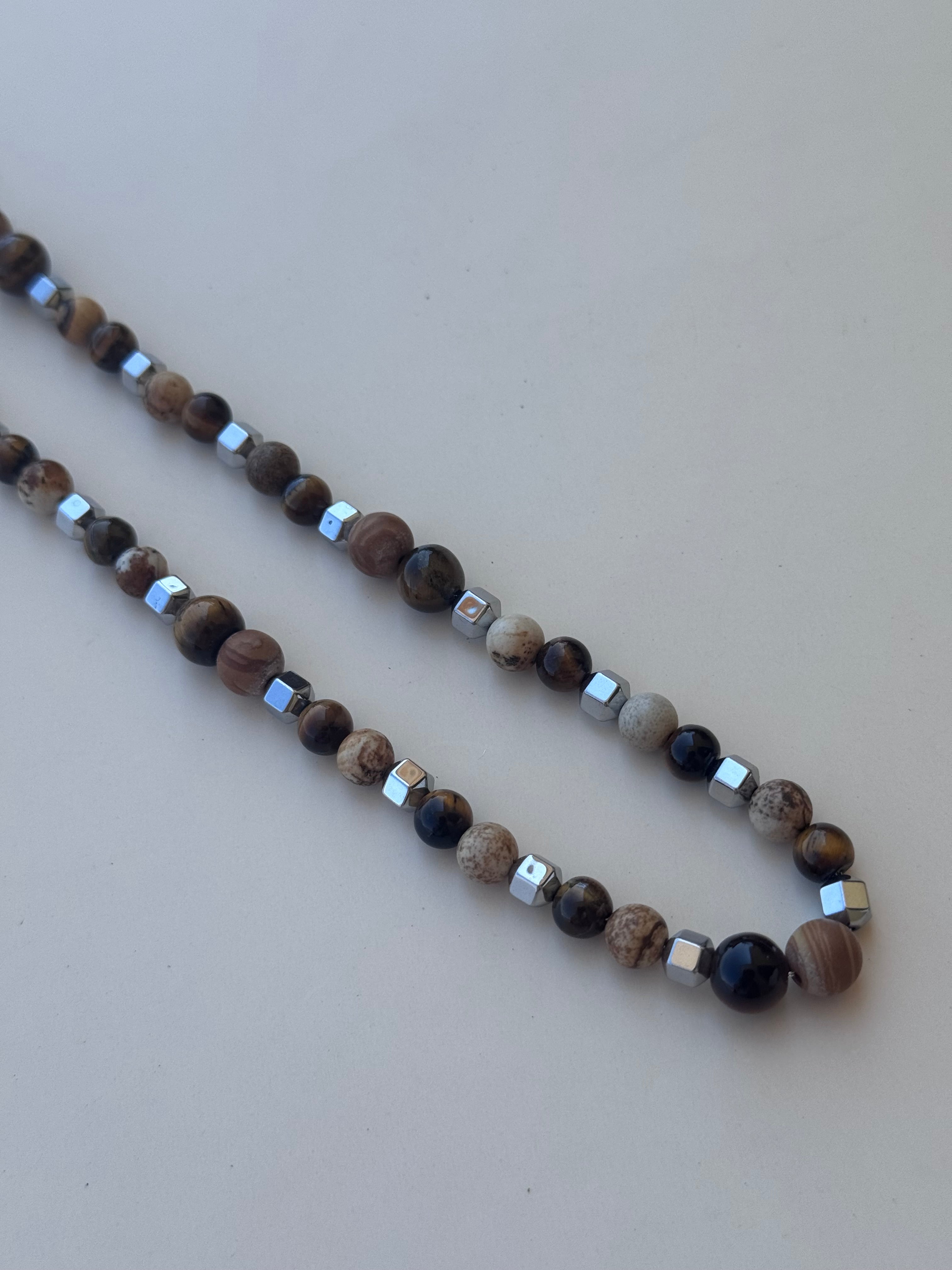 Collana uomo sfumature di marrone