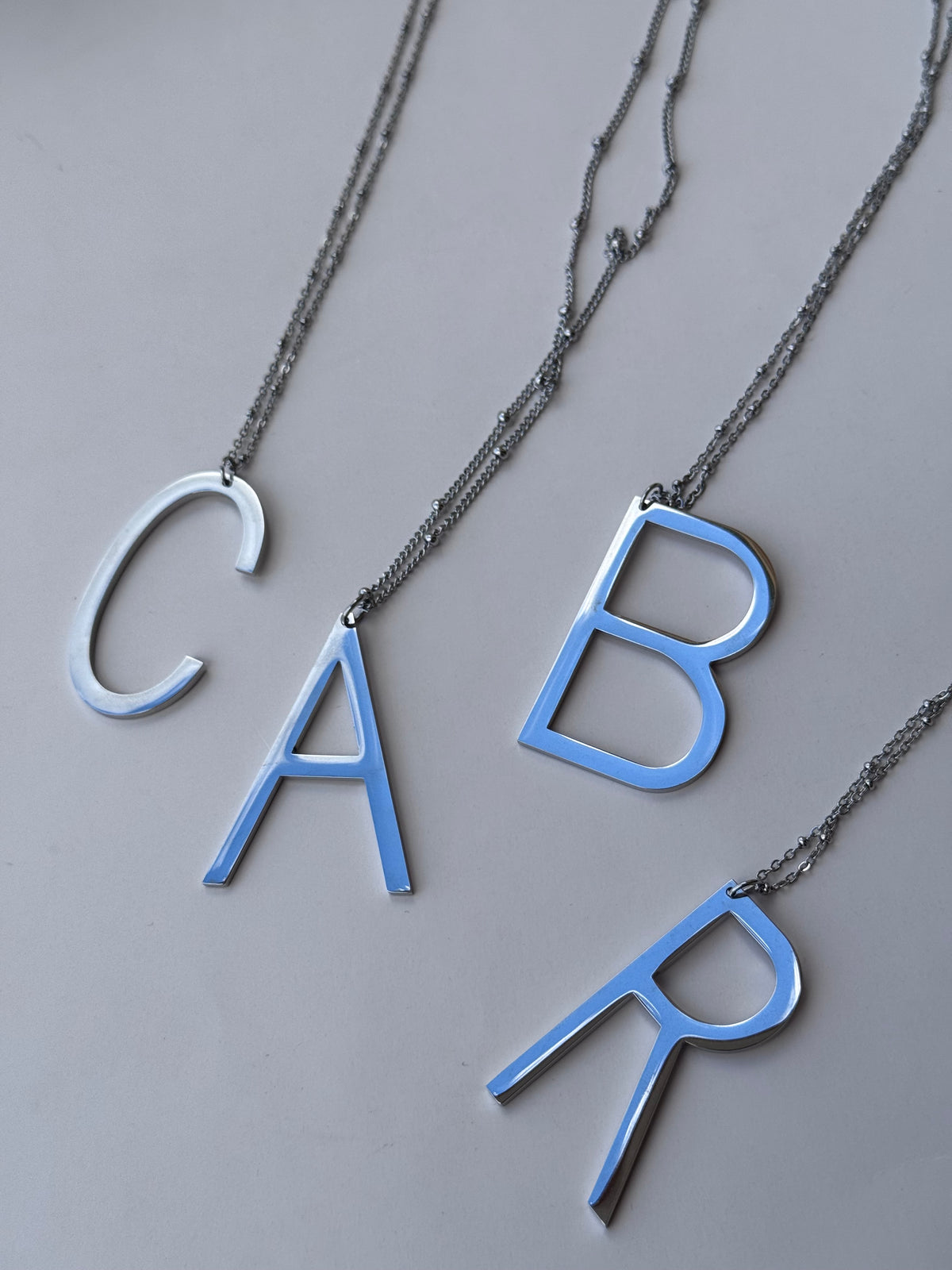 Collana maxi lunghezza lettera big Argento