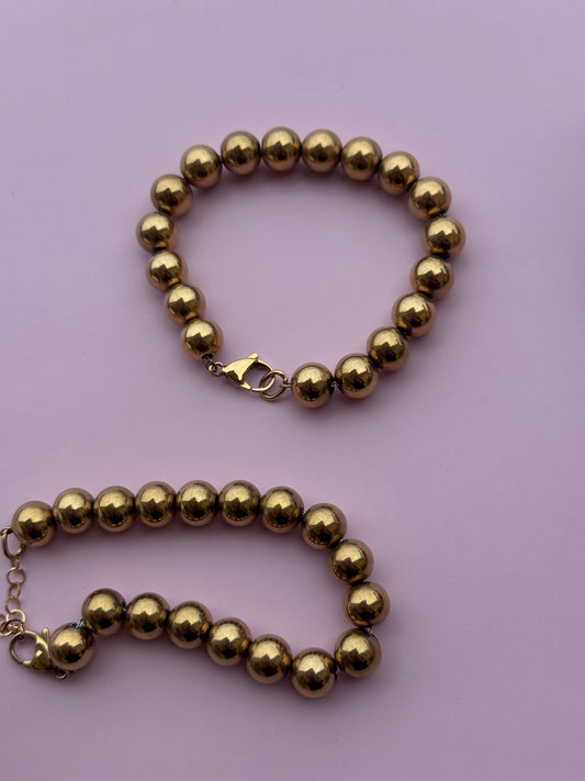 Bracciale sfere dorate